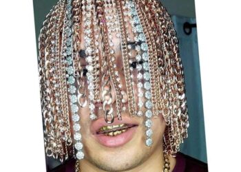 Rapper Implants Gold Chains Into His Head