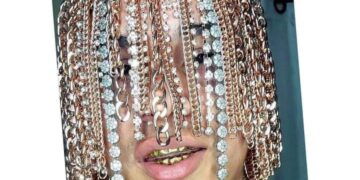 Rapper Implants Gold Chains Into His Head