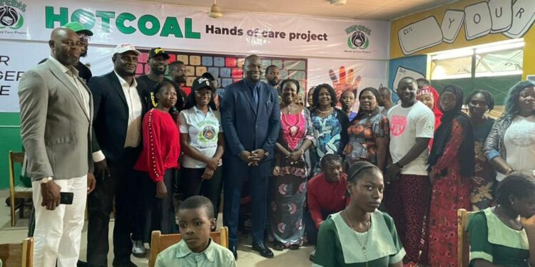 Corps member partners Hot Coal Basketball Club to provide computer lab, basketball court for school in FCT