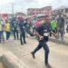 Mob Beats Lagos Policeman Unconscious For Pushing Man Into BRT Lane